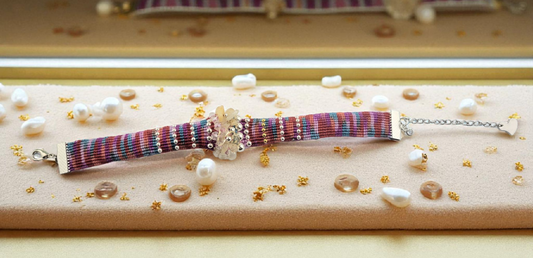 Multicolored beaded woven bracelet with genuine gemstones and 18k gold plated metal beads and clasps, Adjustable Chain. The length 7.5"-9".