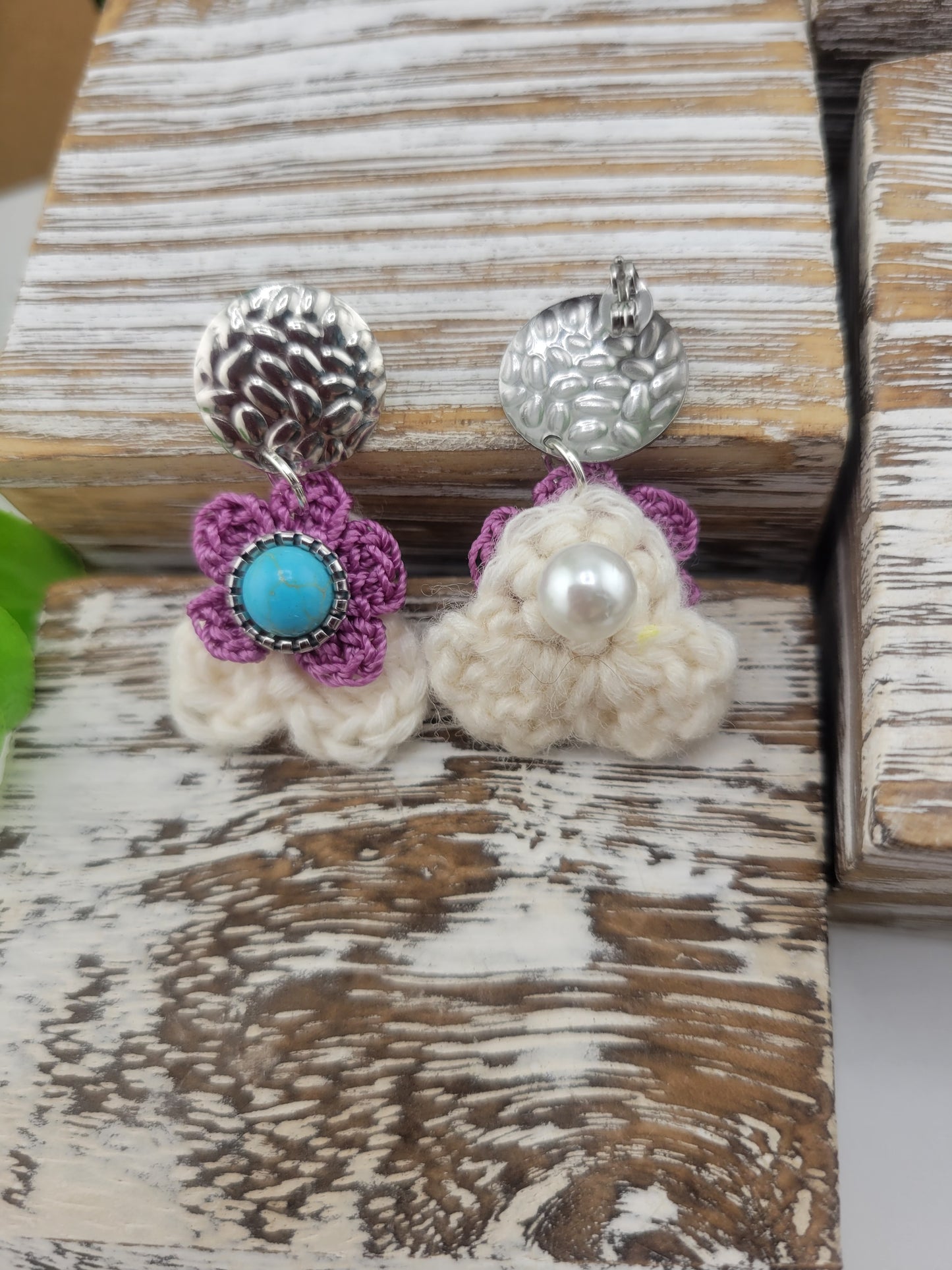 Handmade Bohemian-style Crochet Flower Earrings with a mixed colored stone center, attached to hammered Stainless steel metal earring top