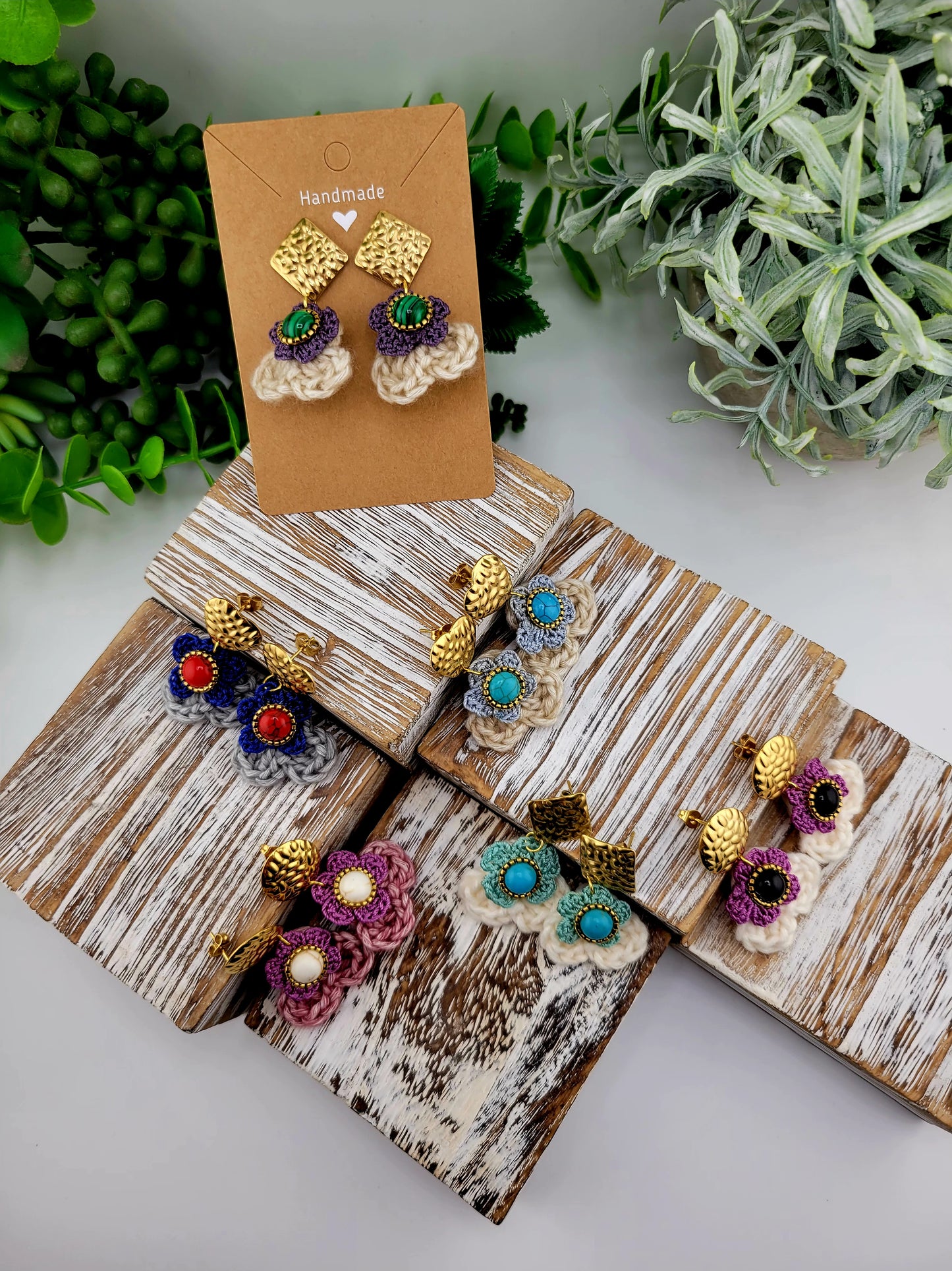 Handmade Bohemian-style Crochet Flower Earrings with a mixed colored stone center, attached to hammered 18k gold plated metal earring top