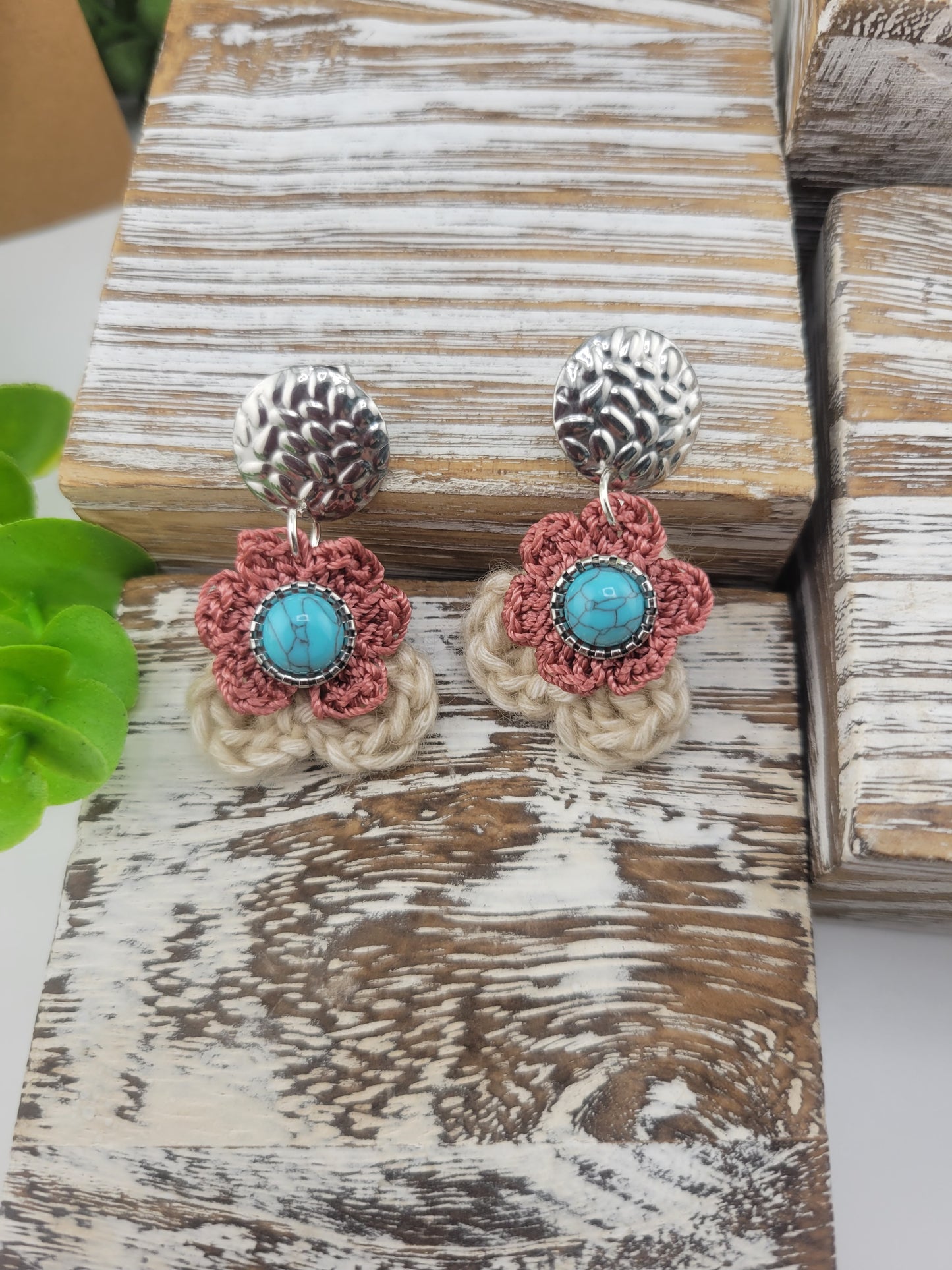 Handmade Bohemian-style Crochet Flower Earrings with a mixed colored stone center, attached to hammered Stainless steel metal earring top