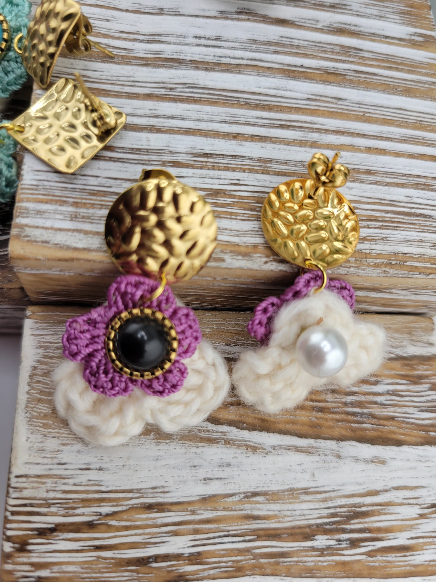 Handmade Bohemian-style Crochet Flower Earrings with a mixed colored stone center, attached to hammered 18k gold plated metal earring top