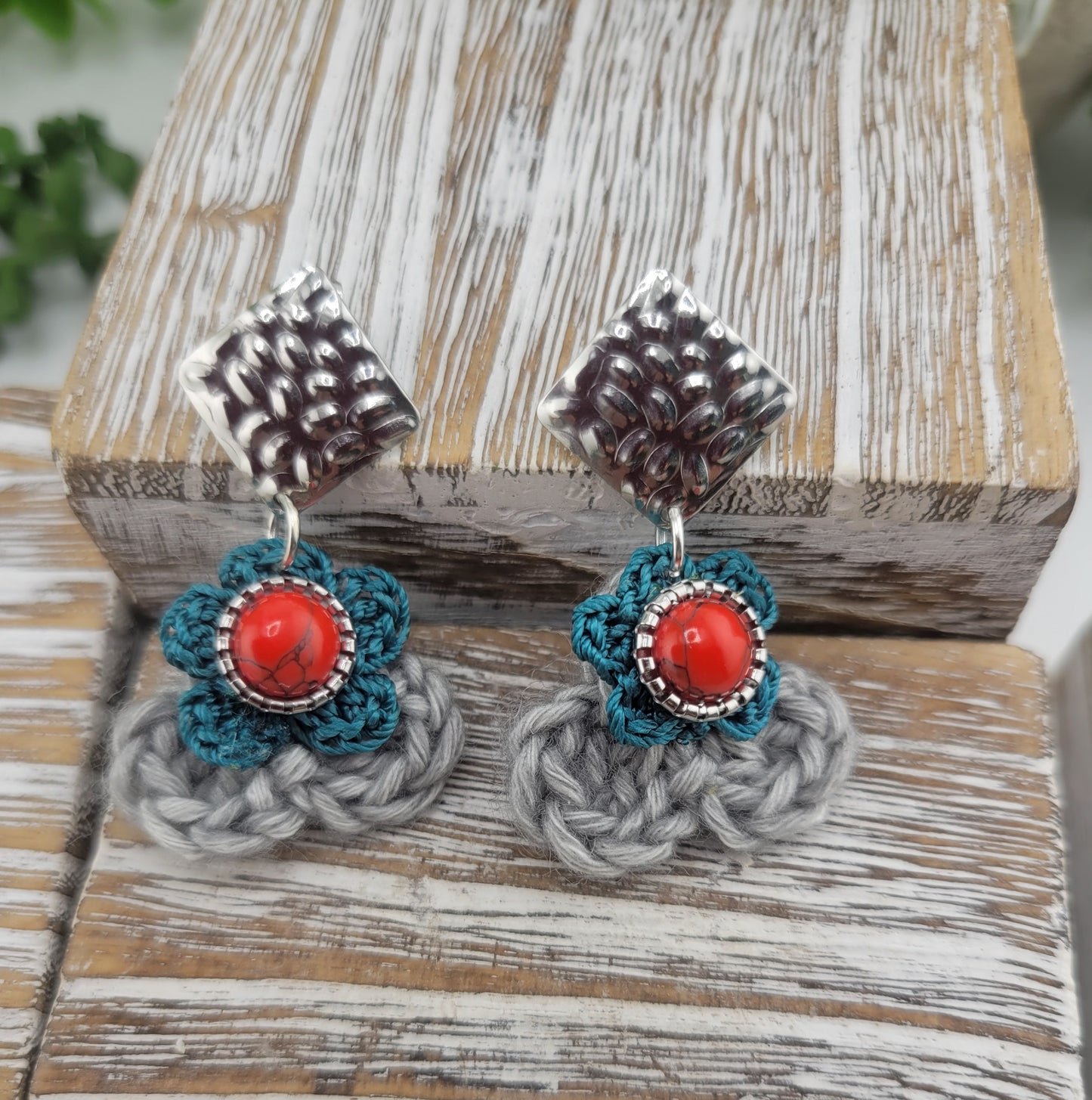 Handmade Bohemian-style Crochet Flower Earrings with a mixed colored stone center, attached to hammered Stainless steel metal earring top