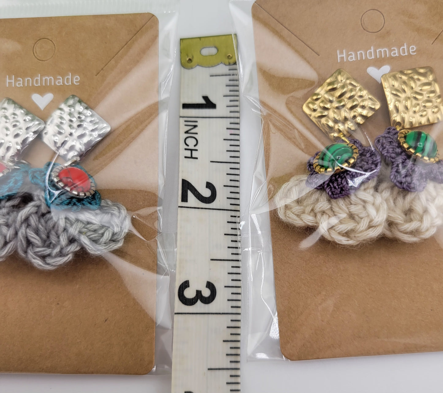 Handmade Bohemian-style Crochet Flower Earrings with a mixed colored stone center, attached to hammered Stainless steel metal earring top