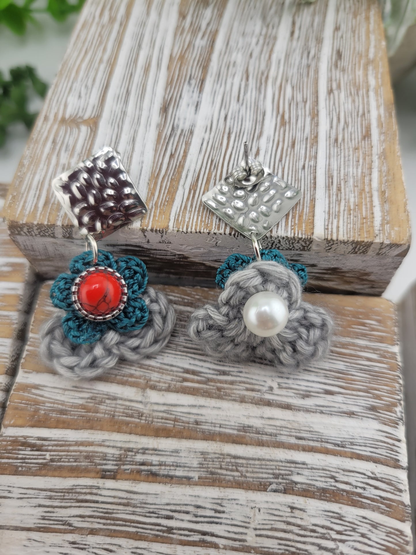 Handmade Bohemian-style Crochet Flower Earrings with a mixed colored stone center, attached to hammered Stainless steel metal earring top