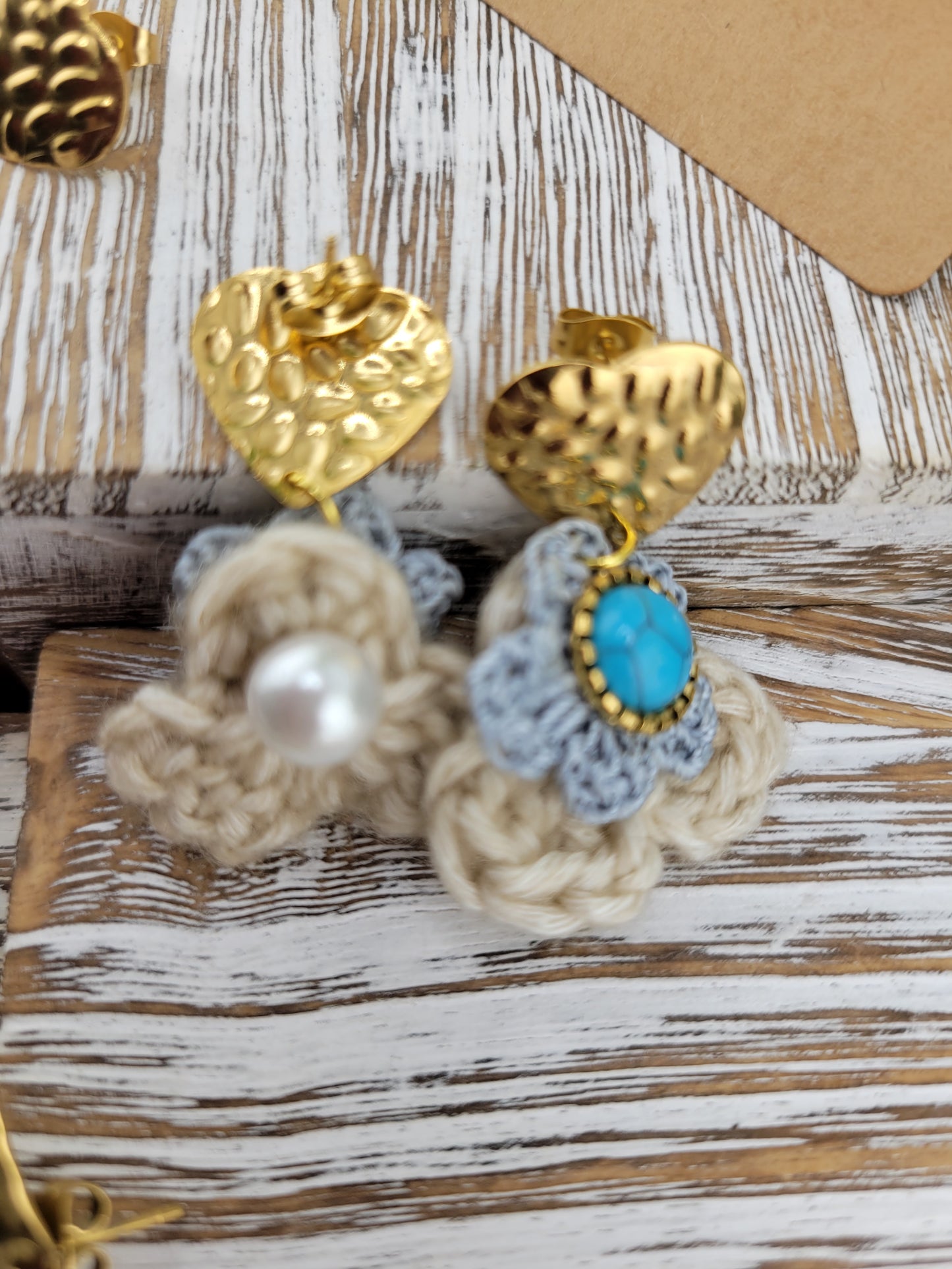Handmade Bohemian-style Crochet Flower Earrings with a mixed colored stone center, attached to hammered 18k gold plated metal earring top