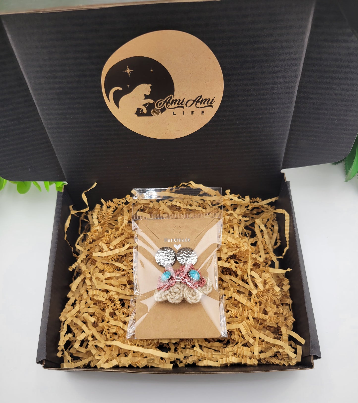 Handmade Bohemian-style Crochet Flower Earrings with a mixed colored stone center, attached to hammered Stainless steel metal earring top