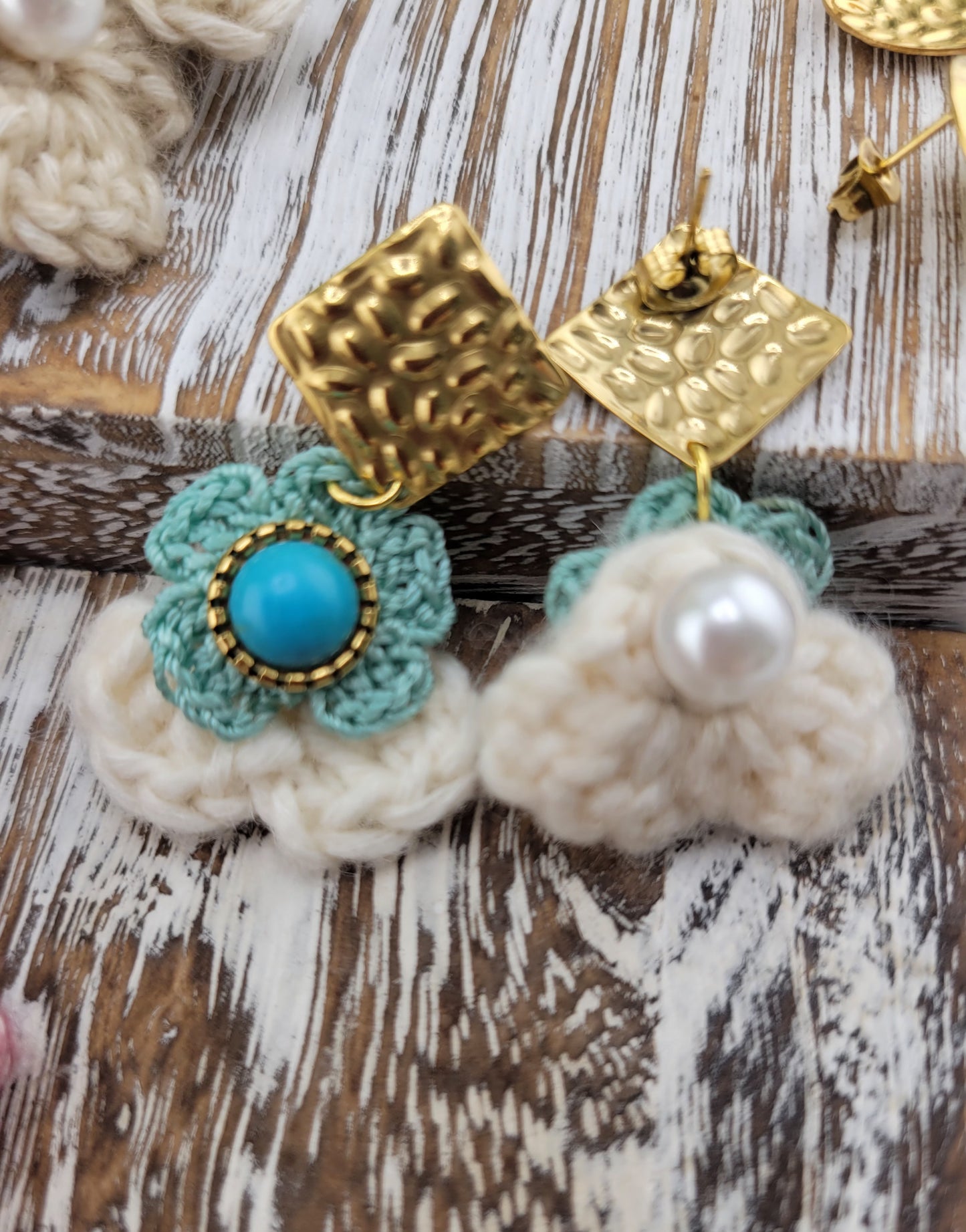 Handmade Bohemian-style Crochet Flower Earrings with a mixed colored stone center, attached to hammered 18k gold plated metal earring top