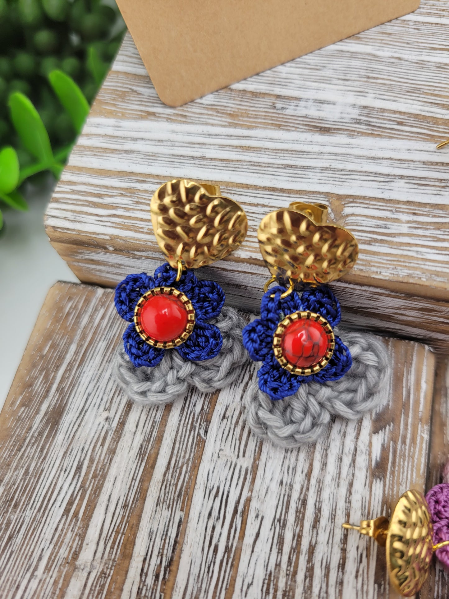 Handmade Bohemian-style Crochet Flower Earrings with a mixed colored stone center, attached to hammered 18k gold plated metal earring top